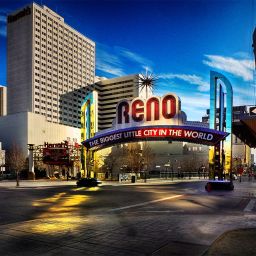 Image of the Reno arch looking south on a blue-sky day.